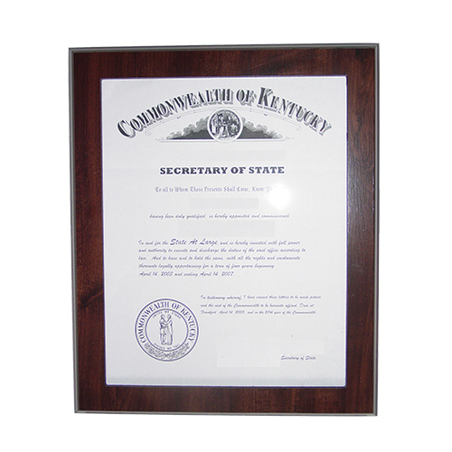 This 11 x 8-1/2 elegant cherry wood finish Illinois notary certificate frame makes an attractive addition to any office. Simply slide your Illinois notary certificate in from the side. No need for nails or screws. Designed to fit 8-1/2 x 11 inch certificates. We can also custom make a frame to fit any state's notary certificates. This Illinois notary certificate frame will Guard your Illinois notary commission certificate from damage with this elegant cherry wood finish frame that makes an attractive addition to any office.